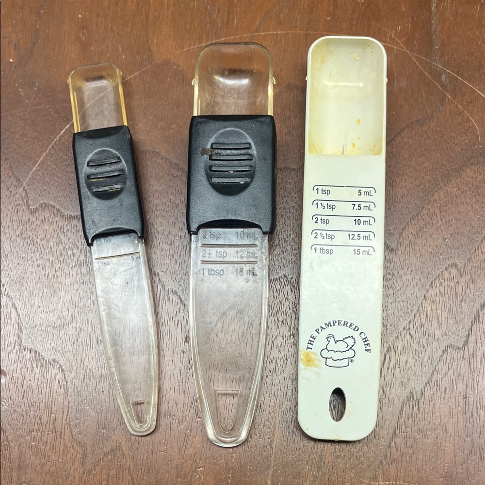 The Pampered Chef Clear and Black Measuring Spoon Trio
